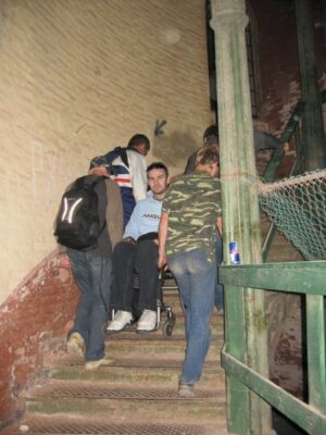 getting carried upstairs to continue drinking vodka in my wheelchair in Russia